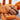 Orphnaecus philippinus (Philippine Tangerine Tarantula) 0.75-1"